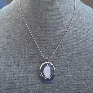 Lia Sophia oblong silver tone modernist cut out pendant necklace